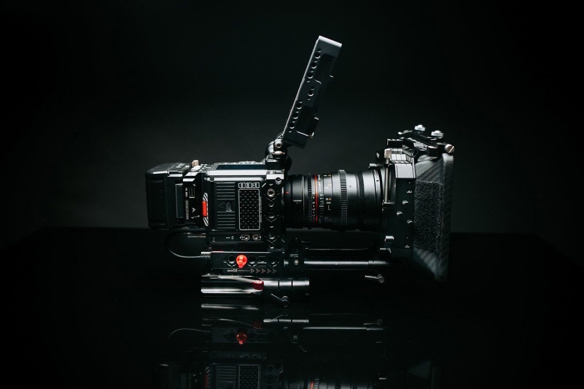 Red komodo 6K minimal rig on the table with black-background.